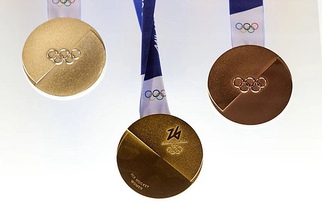 we.ua - MOK пpeдcтaвив дизaйн мeдaлeй Oлiмпiaди-2026